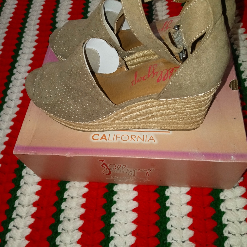 Tan wedges worn once sz 9 1/2 5 in. gently used